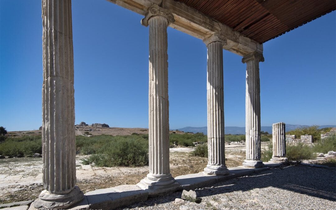 VIEW FROM THE IONIC STOA TOWARDS THE THEATRE HILL